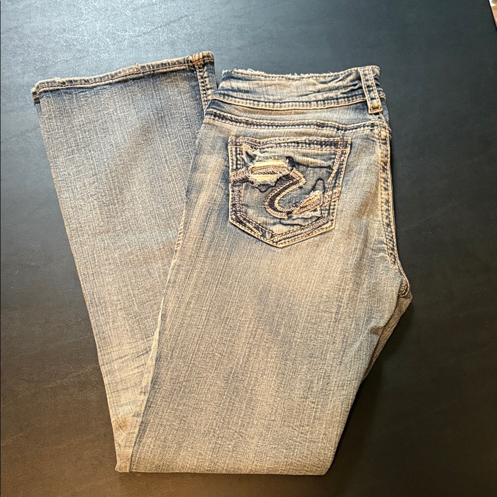 Size 29 x33  women’s Silver jeans Suki Mid boot